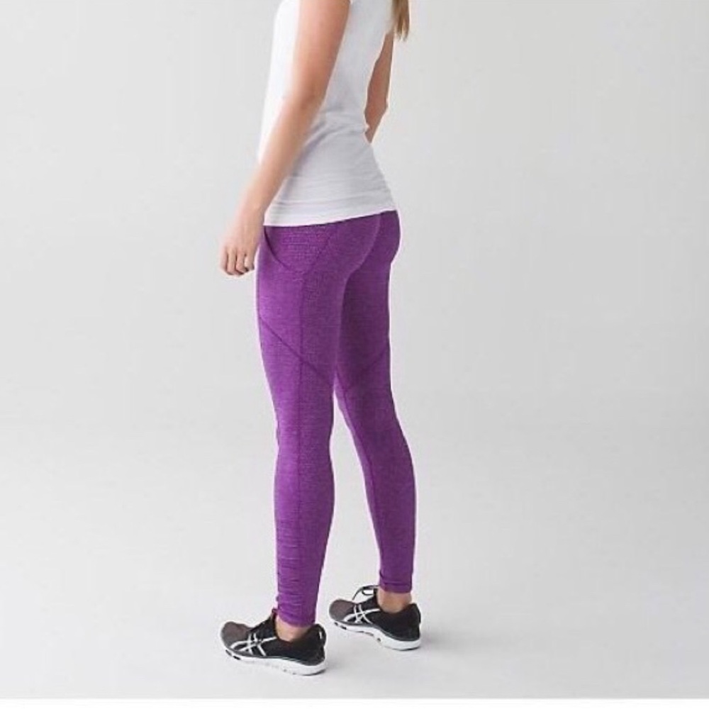 Purple soft lululemon leggings with pockets.